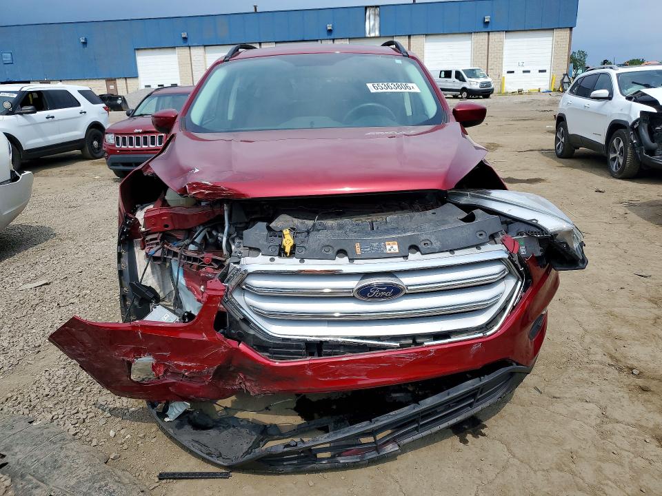 Photo 5 from auction – 2018 FORD ESCAPE with VIN 1FMCU0HD8JUA90772