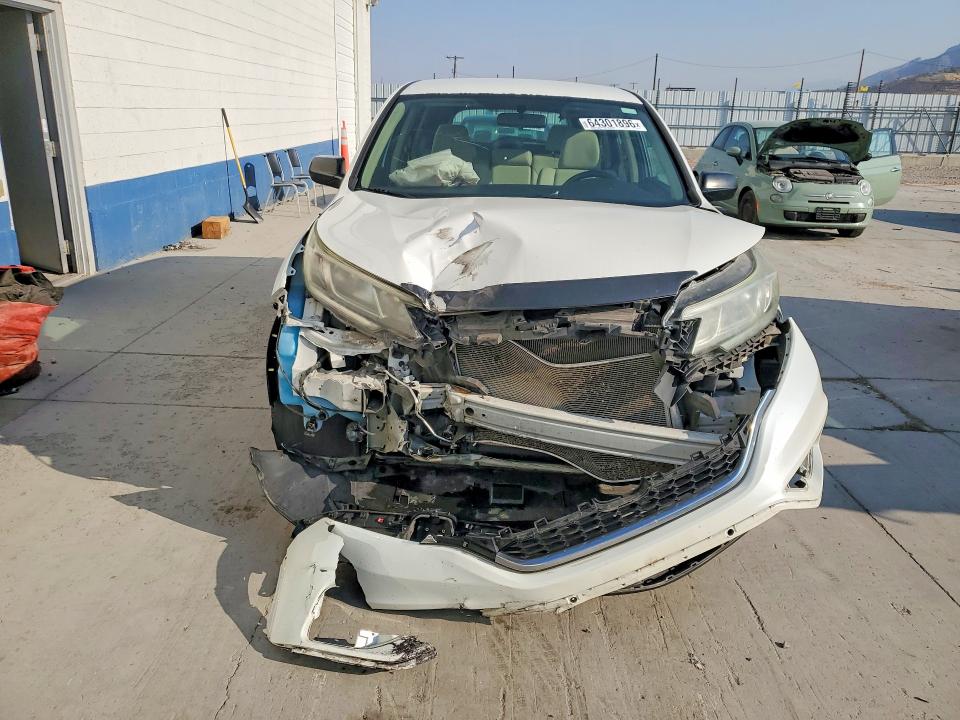 Photo 5 from auction – 2016 HONDA CR-V with VIN 5J6RM4H35GL138170