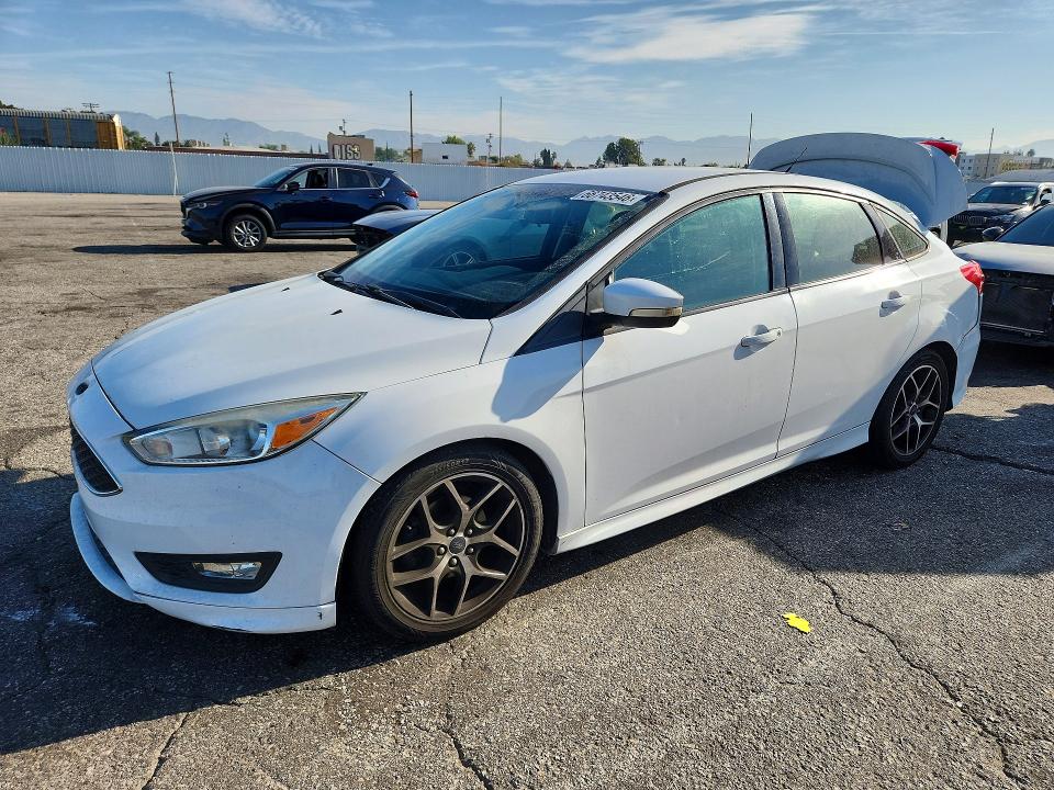 FORD FOCUS 2016 with VIN 1FADP3F26GL306299 - Photo from auction