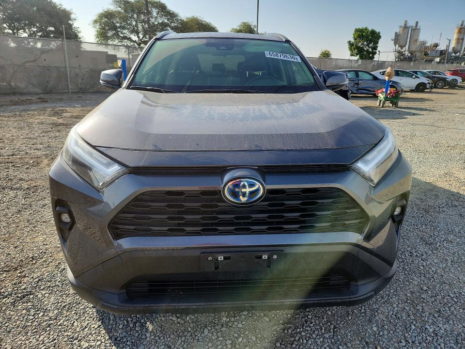 Photo 5 from auction – 2022 TOYOTA RAV4 with VIN JTMB6RFV8ND069906