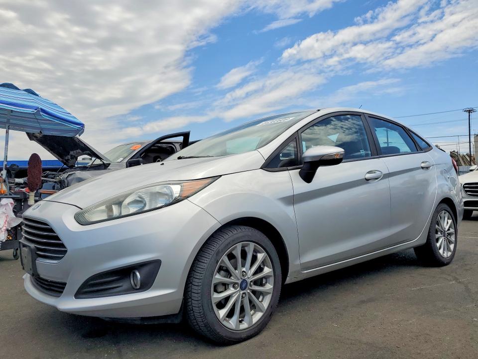 FORD FIESTA 2014 with VIN 3FADP4BJ9EM106824 - Photo from auction