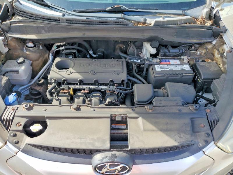 Photo 12 from auction – 2010 HYUNDAI TUCSON with VIN KM8JUCAC6AU093583