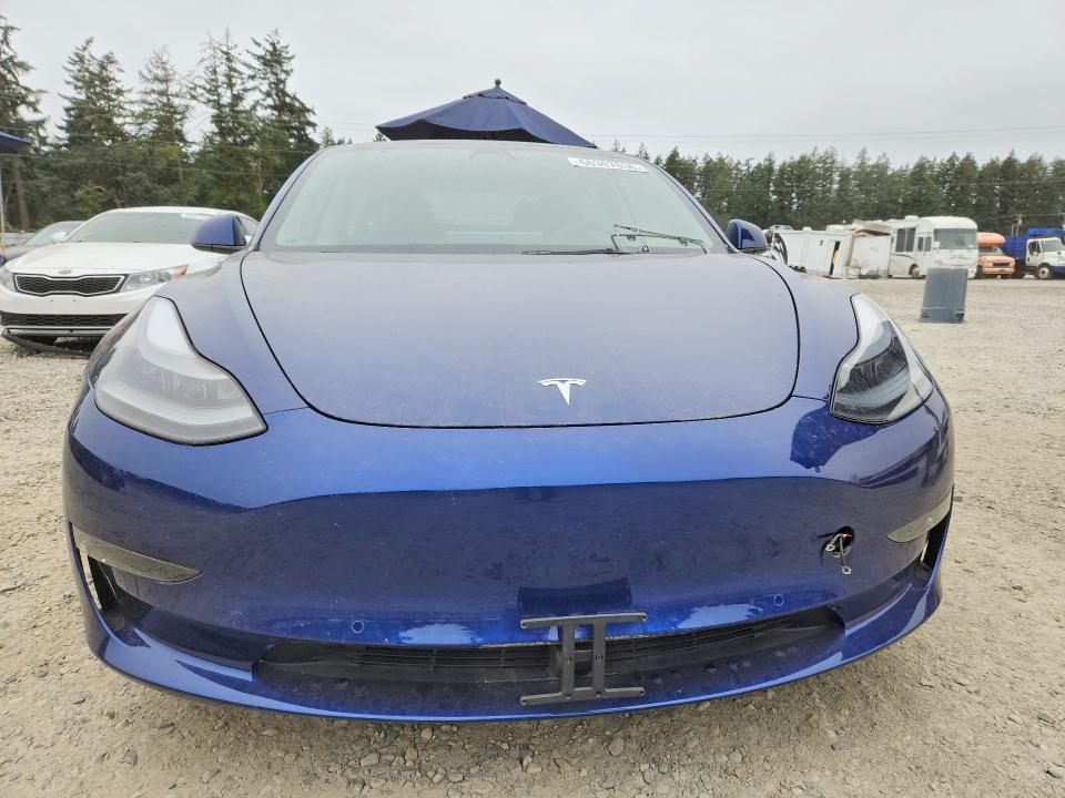 Photo 5 from auction – 2022 TESLA MODEL 3 with VIN 5YJ3E1EB8NF107823