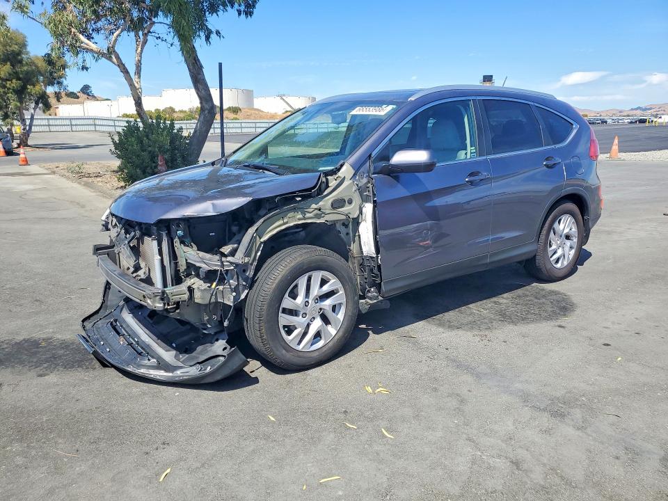 HONDA CR-V 2015 with VIN 2HKRM3H77FH503292 - Photo from auction