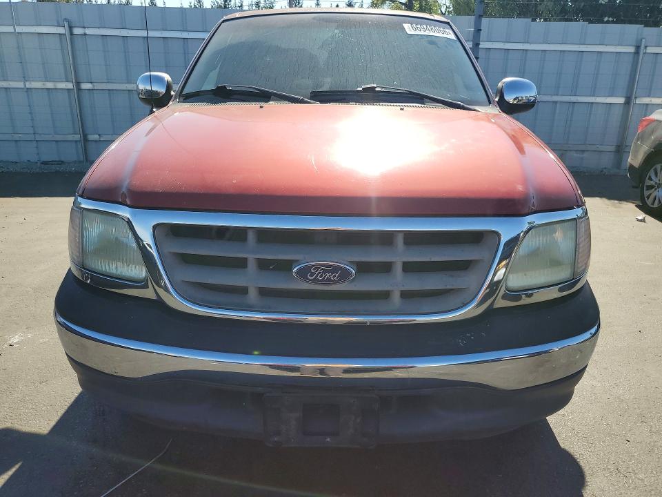 Photo 5 from auction – 2001 FORD F150 with VIN 1FTRX17L71NC04503