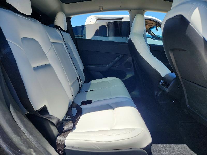 Photo 11 from auction – 2023 TESLA MODEL Y with VIN 7SAYGAEE2PF965739
