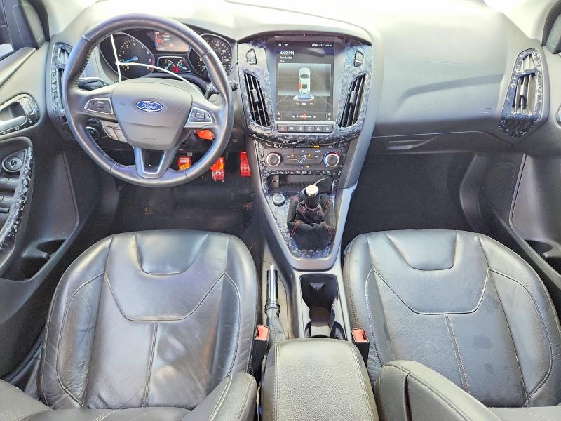 Photo 8 from auction – 2015 FORD FOCUS with VIN 1FADP3K20FL386624