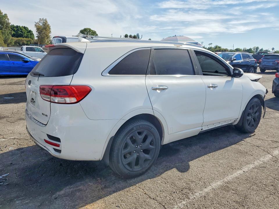 Photo 3 from auction – 2016 KIA SORENTO with VIN 5XYPK4A54GG107857
