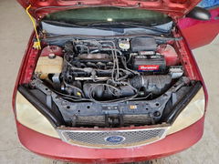 Photo 11 from auction – 2005 FORD FOCUS with VIN 1FAFP34N25W181321