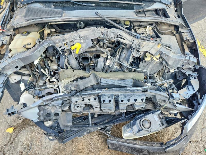 Photo 11 from auction – 2016 FORD FOCUS with VIN 1FADP3F24GL359437