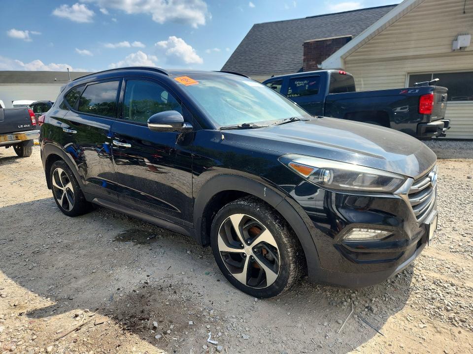 Photo 4 from auction – 2016 HYUNDAI TUCSON with VIN KM8J3CA21GU201305