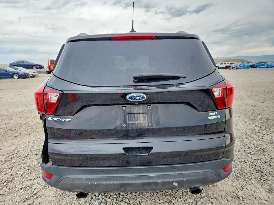 Photo 6 from auction – 2019 FORD ESCAPE with VIN 1FMCU9HD8KUC08227