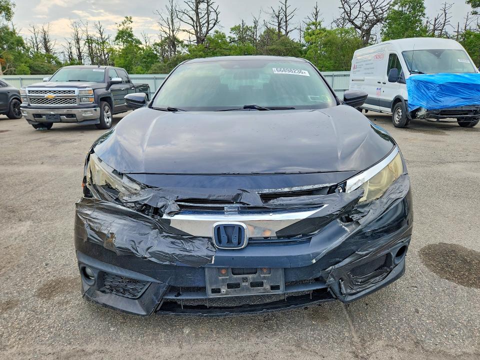 Photo 5 from auction – 2016 HONDA CIVIC with VIN 19XFC1F48GE000671