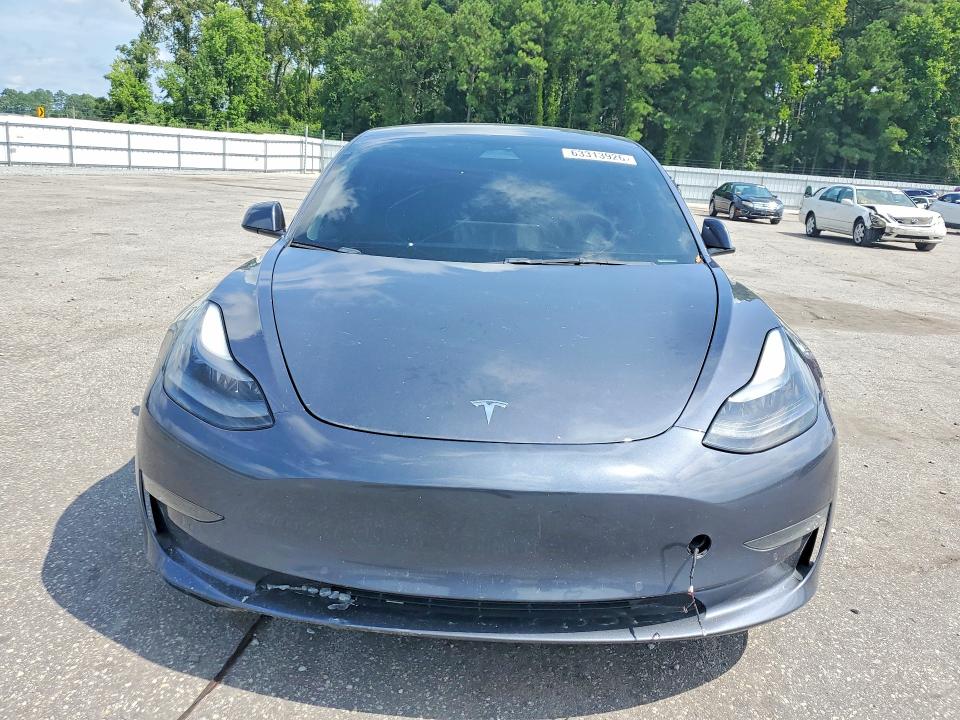 Photo 5 from auction – 2022 TESLA MODEL 3 with VIN 5YJ3E1EC3NF330277