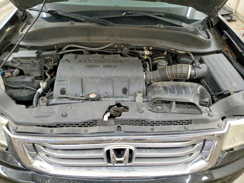 Photo 11 from auction – 2012 HONDA RIDGELINE with VIN 5FPYK1F50CB002236