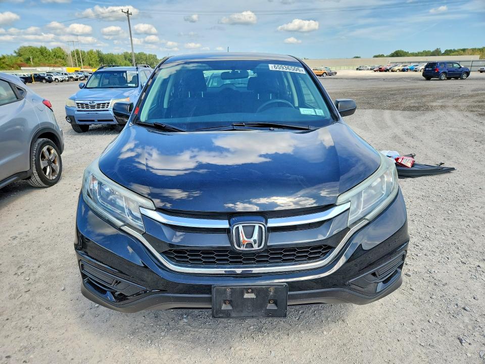 Photo 5 from auction – 2016 HONDA CR-V with VIN 5J6RM4H33GL097571