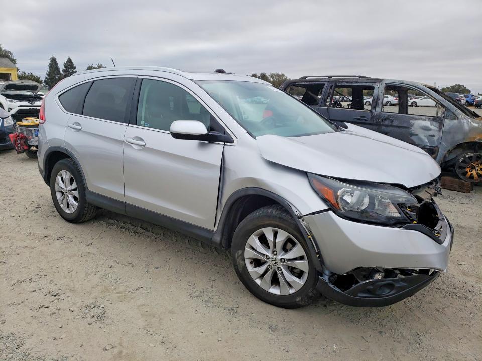 Photo 4 from auction – 2014 HONDA CR-V with VIN 2HKRM4H71EH608494