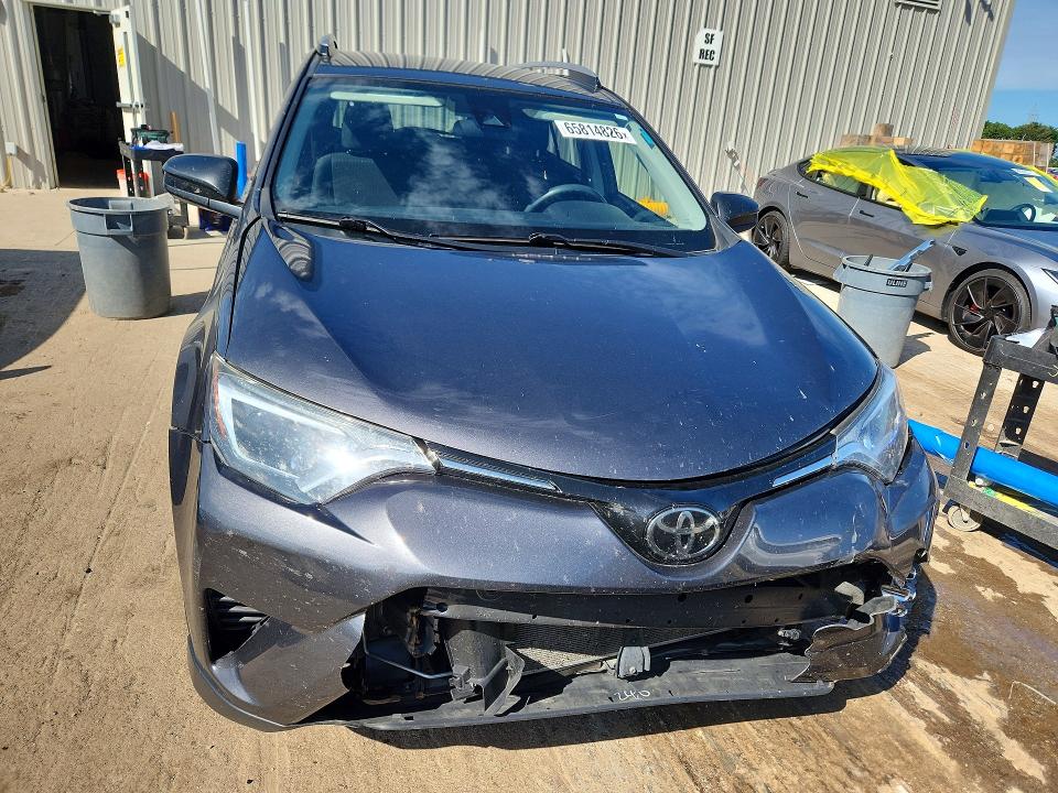 Photo 5 from auction – 2018 TOYOTA RAV4 with VIN JTMZFREV3JJ152669