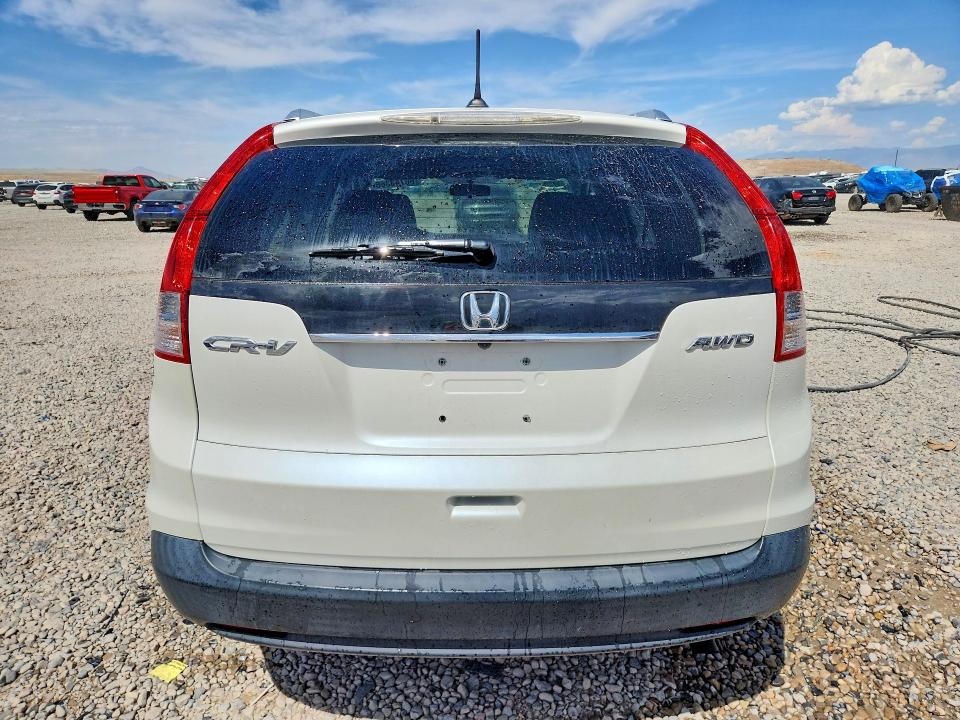 Photo 6 from auction – 2012 HONDA CR-V with VIN 5J6RM4H70CL071068