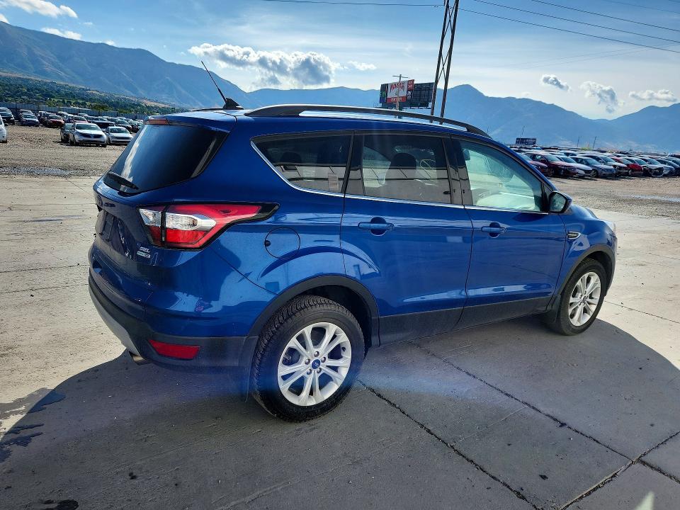 Photo 3 from auction – 2018 FORD ESCAPE with VIN 1FMCU9HD1JUD15439