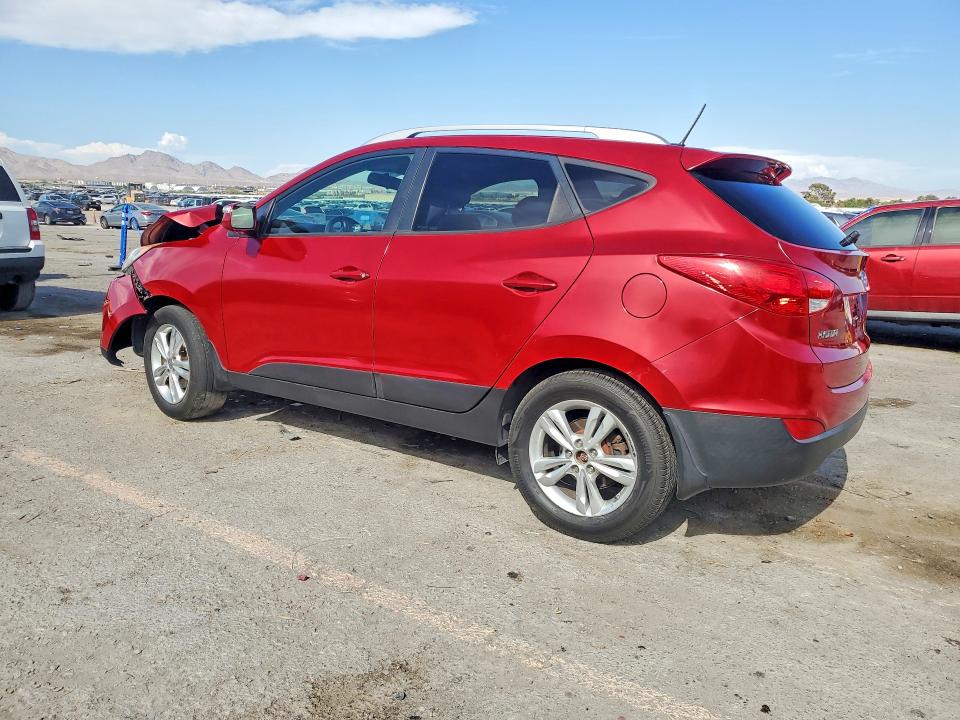 Photo 2 from auction – 2012 HYUNDAI TUCSON with VIN KM8JUCAC5CU511179