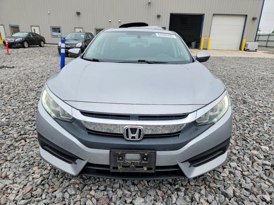 Photo 5 from auction – 2018 HONDA CIVIC with VIN 19XFC2F73JE009396
