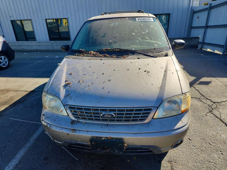 Photo 5 from auction – 2003 FORD WINDSTAR with VIN 2FMDA51443BB60877