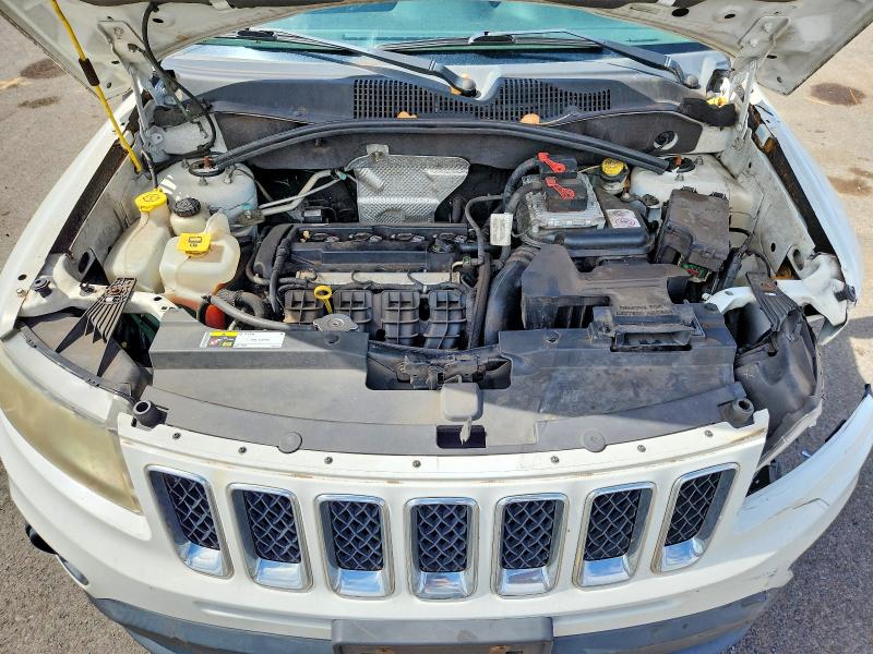 Photo 12 from auction – 2014 JEEP COMPASS with VIN 1C4NJCBA3ED709211