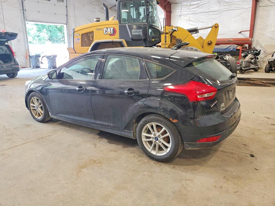 Снимка 2 от търг – 2017 FORD FOCUS с VIN 1FADP3K22HL321664