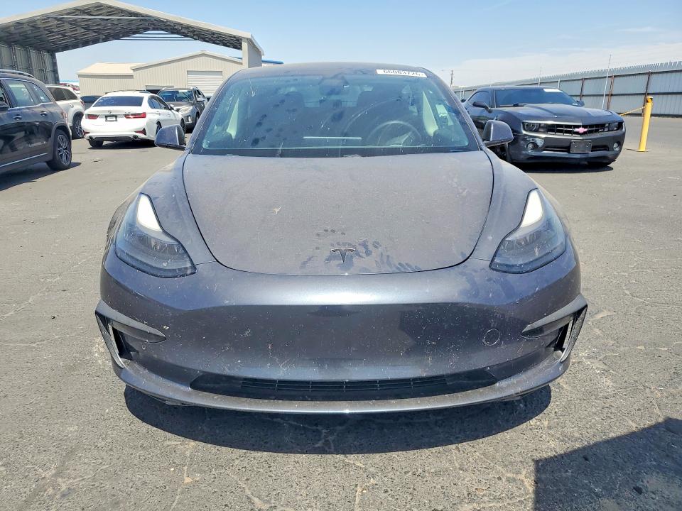 Photo 5 from auction – 2021 TESLA MODEL 3 with VIN 5YJ3E1EB5MF874835
