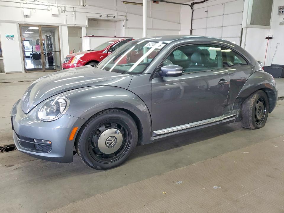 VOLKSWAGEN BEETLE 2016 with VIN 3VWJ17AT5GM605817 - Photo from auction