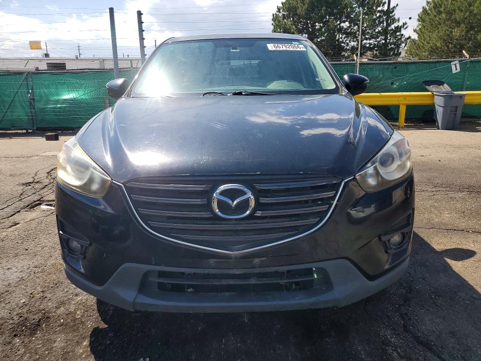 Photo 5 from auction – 2016 MAZDA CX-5 with VIN JM3KE2CYXG0632884