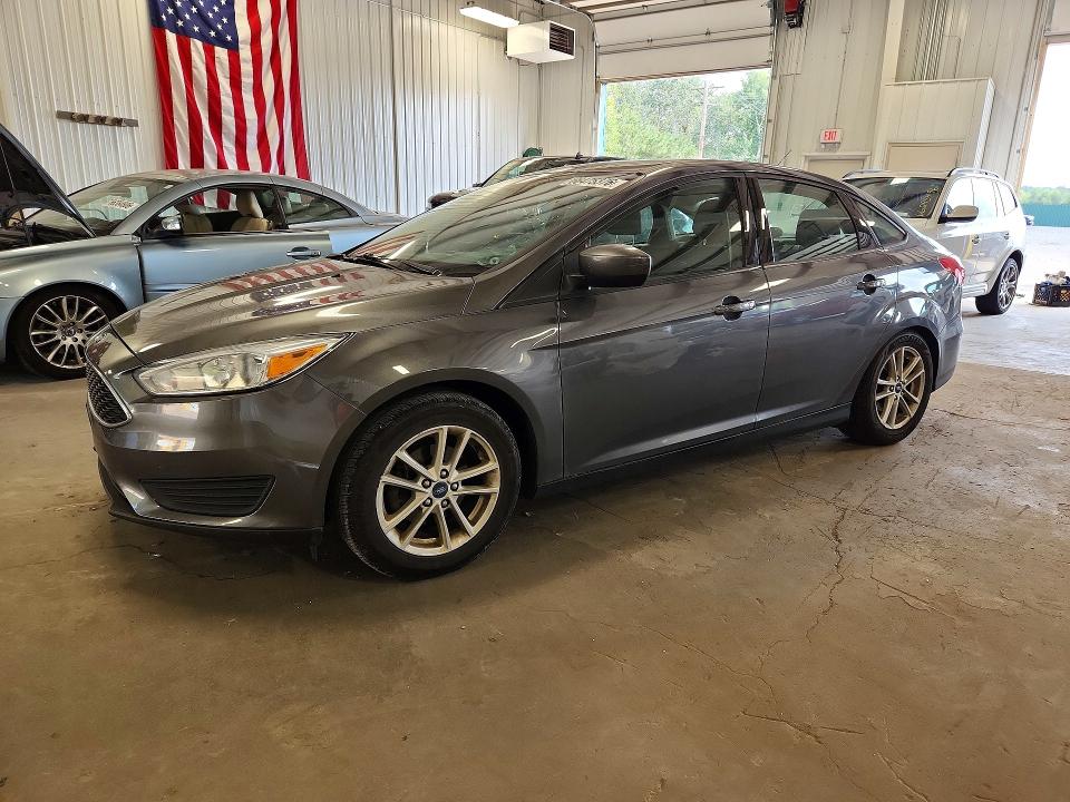 FORD FOCUS 2018 with VIN 1FADP3FE7JL331214 - Photo from auction