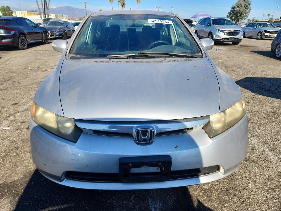Photo 5 from auction – 2006 HONDA CIVIC with VIN JHMFA36236S023902