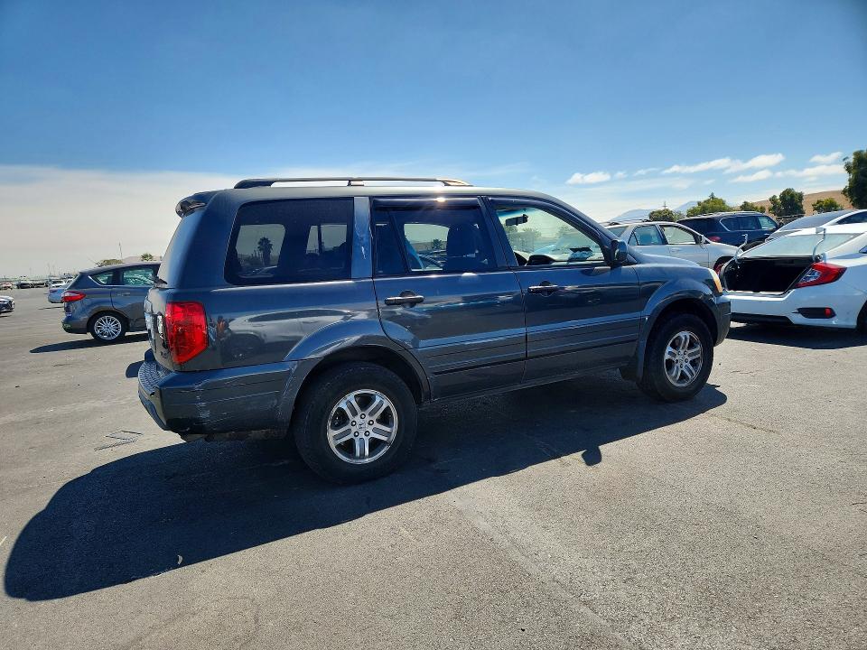Photo 3 from auction – 2004 HONDA PILOT with VIN 2HKYF18504H616085