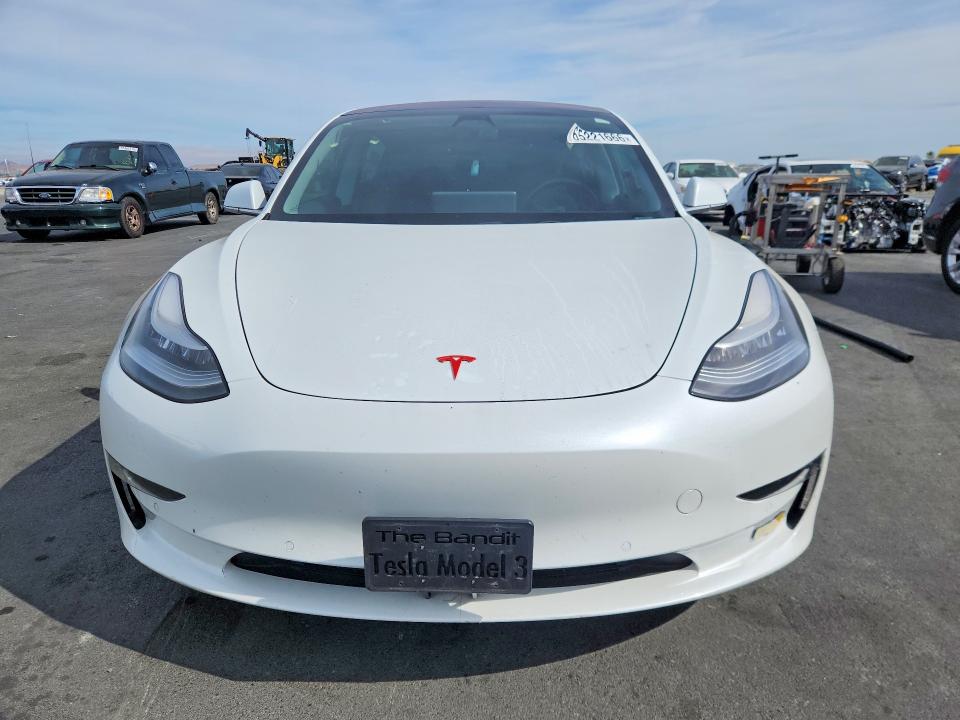 Photo 5 from auction – 2018 TESLA MODEL 3 with VIN 5YJ3E1EA0JF062569