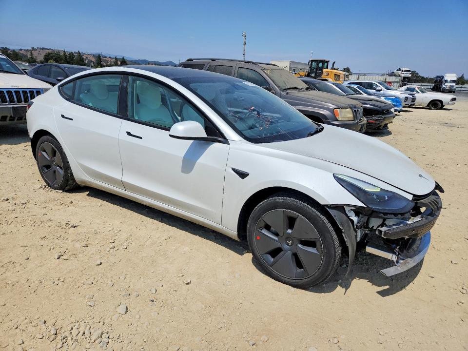 Photo 4 from auction – 2022 TESLA MODEL 3 with VIN 5YJ3E1EA3NF322209