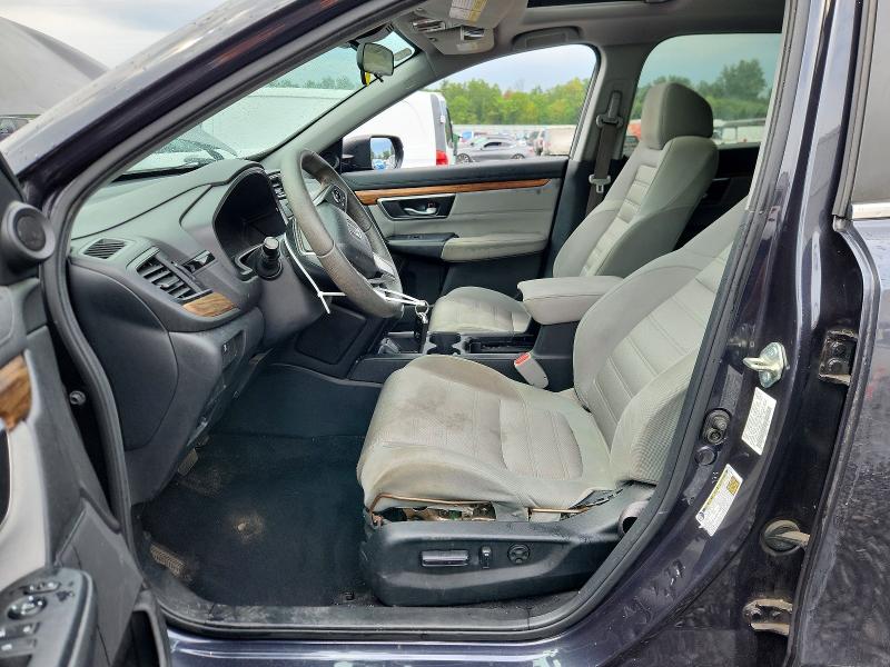 Photo 7 from auction – 2018 HONDA CR-V with VIN 7FARW2H57JE065002