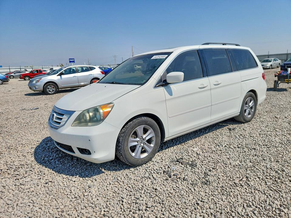 HONDA ODYSSEY 2010 with VIN 5FNRL3H90AB047342 - Photo from auction