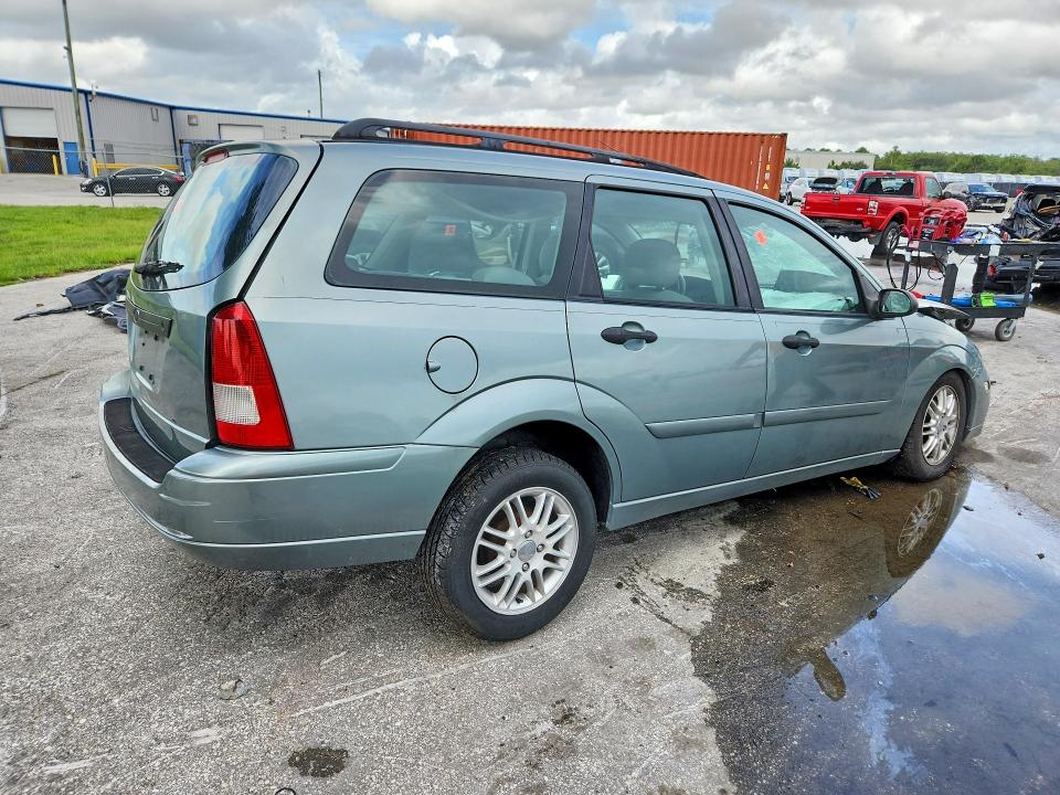 Photo 3 from auction – 2003 FORD FOCUS with VIN 1FAFP36383W213942