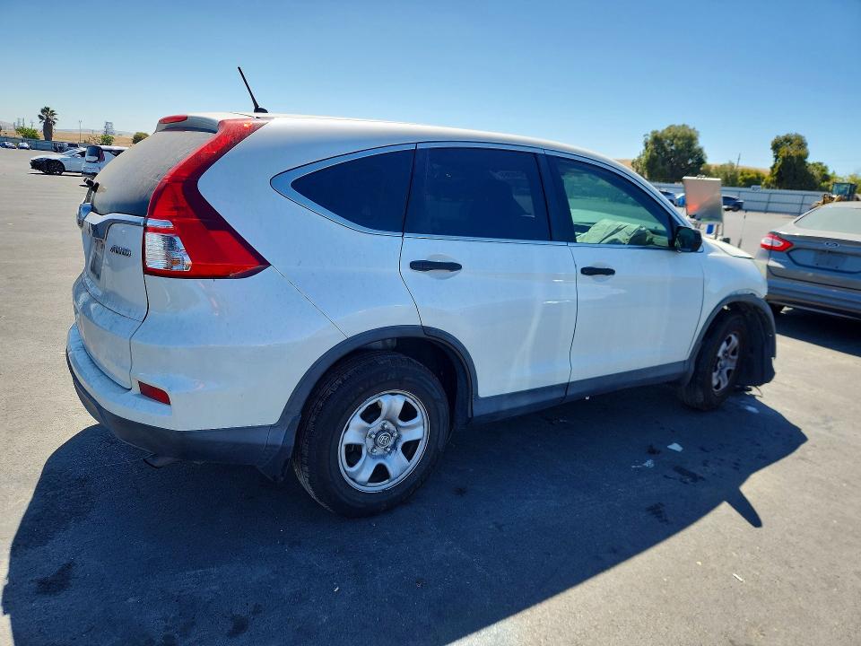 Photo 3 from auction – 2015 HONDA CR-V with VIN 5J6RM4H35FL024572