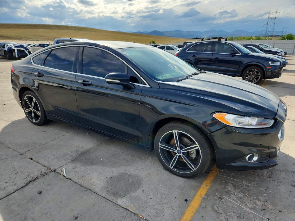 Foto 4 de la subasta – 2014 FORD FUSION con VIN 3FA6P0HD9ER219744