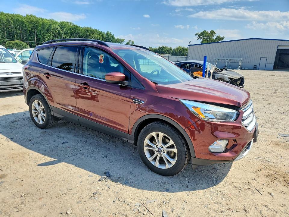 Photo 4 from auction – 2018 FORD ESCAPE with VIN 1FMCU0GD1JUA95393