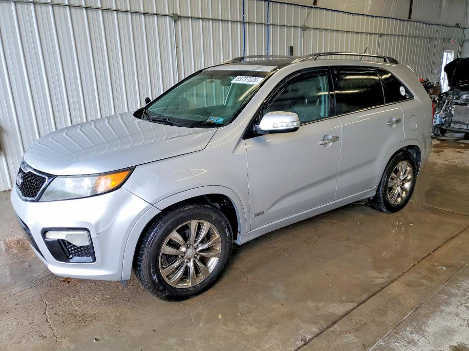 KIA SORENTO 2012 with VIN 5XYKWDA25CG255921 - Photo from auction
