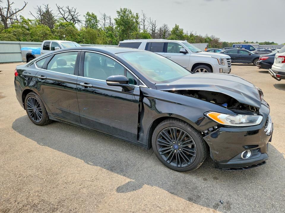 Photo 4 from auction – 2016 FORD FUSION with VIN 3FA6P0HDXGR286677