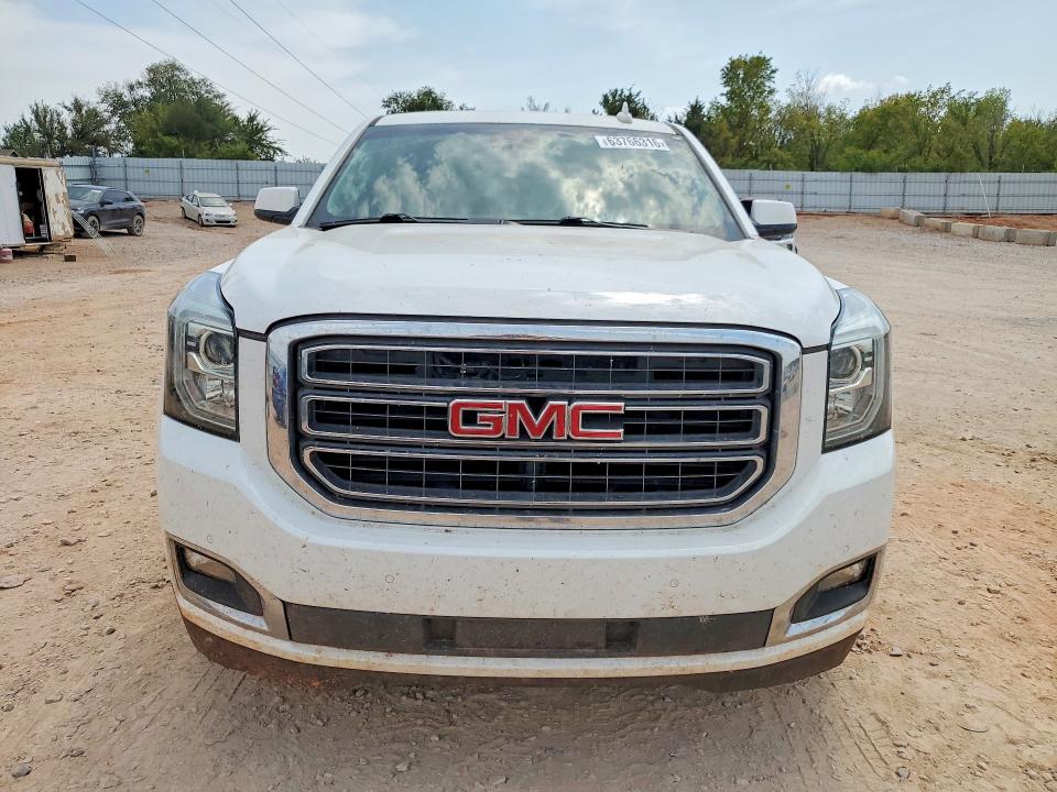 Photo 5 from auction – 2018 GMC YUKON with VIN 1GKS1BKCXJR164625