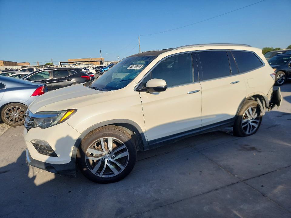 HONDA PILOT 2017 with VIN 5FNYF6H92HB044313 - Photo from auction