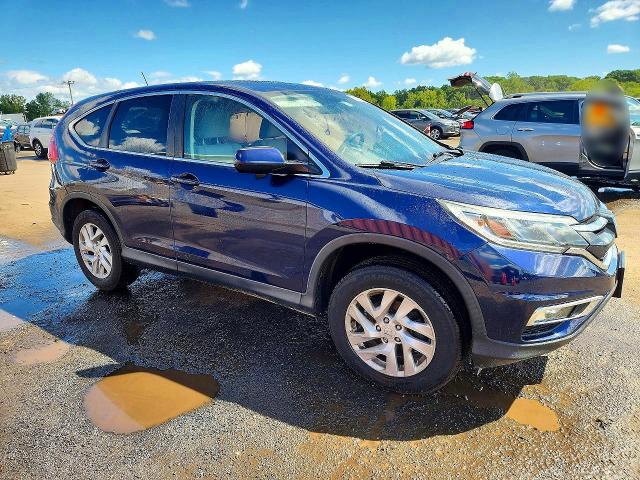 Photo 4 from auction – 2015 HONDA CR-V with VIN 2HKRM4H53FH664937