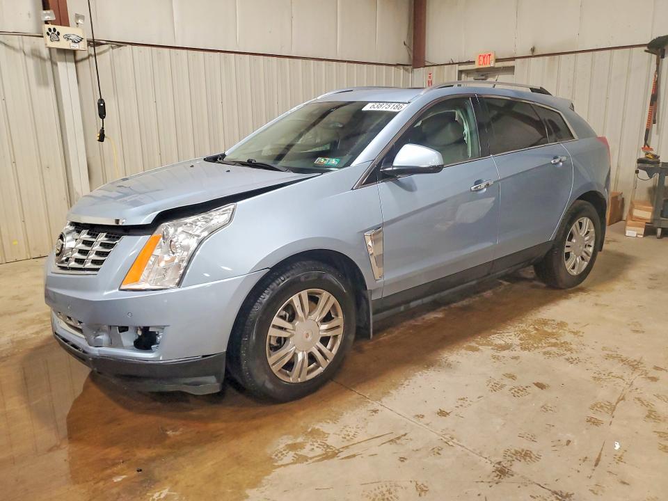 CADILLAC SRX 2014 with VIN 3GYFNEE34ES592587 - Photo from auction