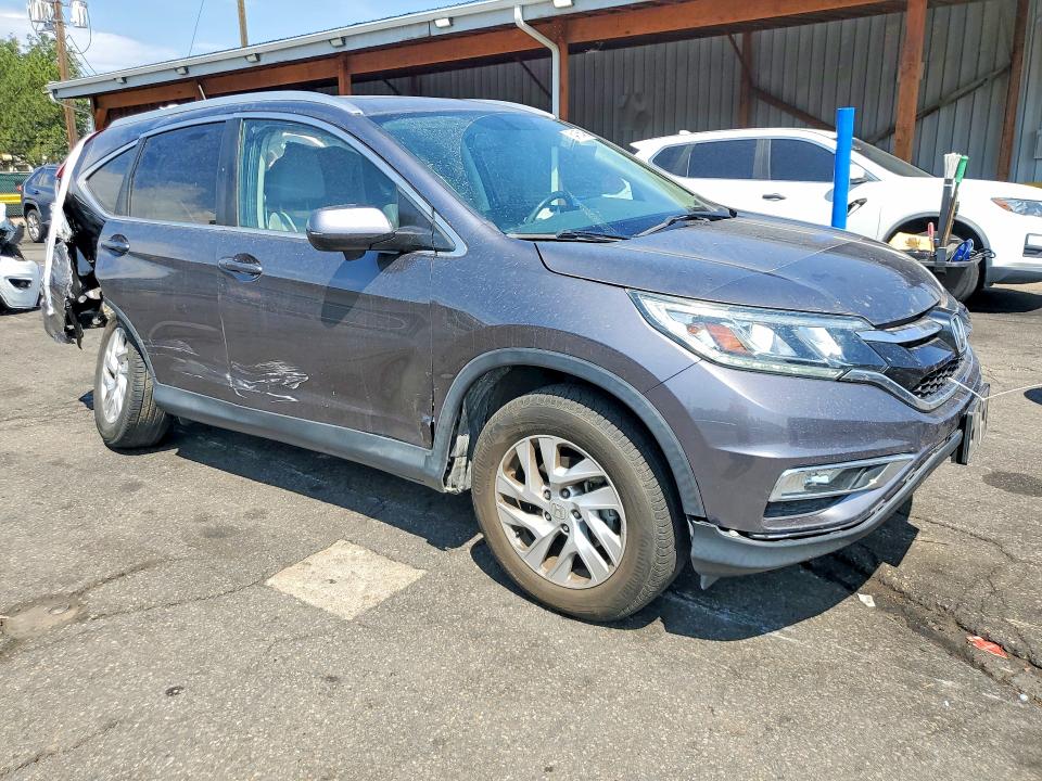 Photo 4 from auction – 2015 HONDA CR-V with VIN 2HKRM4H71FH683634